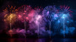 A stunning array of fireworks lights up the night sky with vibrant colors reflected over a tranquil water surface.