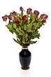 Dried bouquet of red roses in a black vase