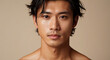 © triocean - Close up of handsome Japanese male model with glowy skin and modern hairstyle