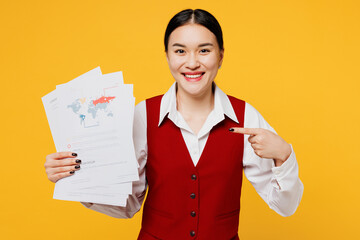 Wall Mural - Young lawyer employee business woman of Asian ethnicity wear formal red vest shirt work at office hold point finger paper account documents isolated on plain yellow background studio. Career concept.