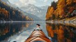 Scenic view from a kayak on a tranquil mountain lake, perfect for outdoor enthusiasts