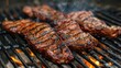 © buraratn - Sliced flank steak cooked medium on a charcoal grill