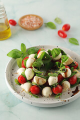 Wall Mural - A plate with Italian salad caprese canape