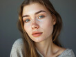 A young woman with a clean, natural and professional makeup look 