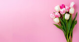 Fototapeta Tulipany - Pink and white tulips on a pink background