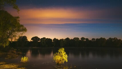 Wall Mural - Night Sky Above River. 4k Timelapse. Night Sky Turns Into Morning. The Stars Float Across Sky. Dawn Is Coming. From Dusk To Dawn. Time Lapse, Timelapse, Time-lapse.