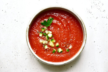 Wall Mural - Gazpacho - traditional spanish cold  soup with cucumber and garlic. Top view with copy space.