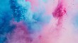 Close-up of blue and pink colored powder clash in the air