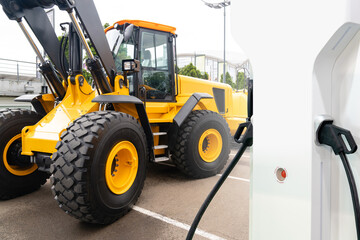 Poster - Electric construction machines with charging station. Concept