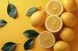 Group of Oranges With Leaves on Yellow Background