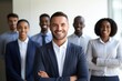 © Anatolii - A diverse group of professional business people with a confident male leader at the forefront smiling. Professional Team with Confident Leader Portrait