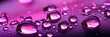 Vibrant Pink Water Droplets on Glossy Surface
