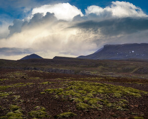 Wall Mural - View during auto trip in West Iceland highlands, Snaefellsnes peninsula, Snaefellsjokull National Park. Spectacular volcanic tundra landscape with mountains, craters, lakes, gravel roads.