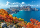 Fototapeta  - Breathtaking view of coastal cliffs with autumn foliage overlooking serene blue ocean waters