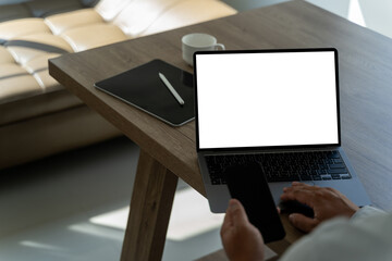 Poster - young man working businessman using a desktop computer of the blank screen