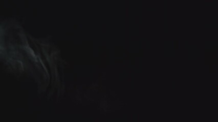 Poster - Close-up of smoke and ray of light in dark. Media. Streams of smoke move in dark with line of light. Light from spotlight illuminates beautiful streams of smoke in dark