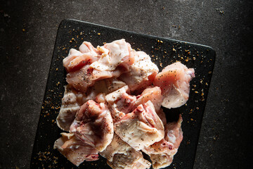 Poster - Raw chicken seasoned with various spices	