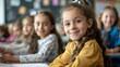 © pinkrabbit - primary elementary school group of children studying in the classroom. learning and sitting at the desk. young cute kids smiling, high quality photo