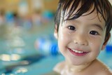 プールで水泳の練習をする日本人の子供(スイミング・運動・夏)