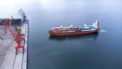 A ship at sea near the sea port