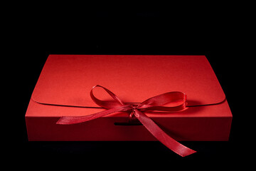 Man gift concept. gift box with luxury bow on dark background. Horizontal with copy space.