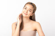 © Shutter B - Happy beautiful young asian woman smile touching her face on white background, clean fresh bare skin concept. Facial treatment, Perfect skin, Natural make up.