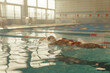 swimming pool indoor with swimmers