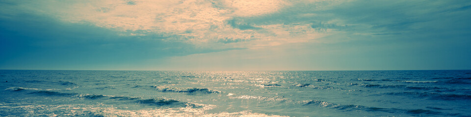 Wall Mural - seascape in the early morning. sunrise over the sea. nature landscape. horizontal banner
