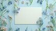 Blank white board and forget me nots flower for greeting text message