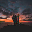 A young couple about to get engaged in front of a lighthouse at sunset. The man is proposing to the woman.