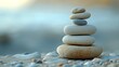 Balanced Pebble Stack on Sandy Beach Harmony and Tranquility in Nature's Elements
