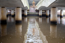 Photo Of The Underside Of A Bridge In The City. 