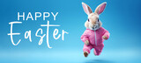 Fototapeta Na ścianę - Funny easter concept holiday animal greeting card illustration with text - Cool jumping running easter bunny with pink jogging suit, isolated on blue background