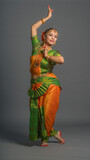 Fototapeta Miasto - Indian woman dancing Classic Indian Dance 
