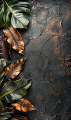 Canvas Print - Ornate golden and green leaves are arranged on a textured dark background.