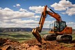Excavator digging and moving earth on a construction site under the clear blue sky