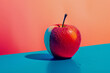 Fresh red apple with water droplets on blue surface