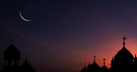 Wall Mural - silhouette dome mosques with crescent on dusk sky, religious of islamic well free space for text ram