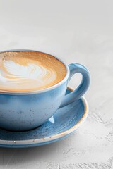 Poster - A cup of coffee on a saucer on a table. Suitable for cafe or restaurant concept