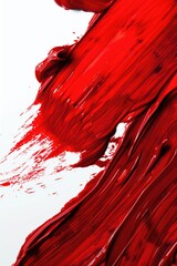 Poster - Close-up view of red paint on white surface, suitable for backgrounds or art projects