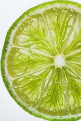 Poster - A close up of a fresh slice of lime. Perfect for food and drink concepts