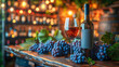 Wine bottle, glass and grapes on wooden table in vineyard, wine tasting concept