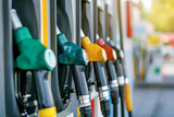 Fototapeta Most - Fuel nozzle or fuel dispenser in gas station, one of the world's most traded commodities and vital to the economy, increase and decrease in oil prices, demand supply in oil