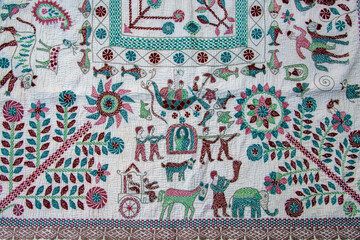 Discover the artistry of intricate hand-sewn Nakshi Kantha, a timeless Bangladeshi textile tradition blending colorful designs and cultural heritage through exquisite stitching