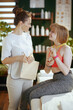 © Alliance - happy female medical massage therapist in massage cabinet