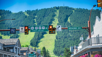 Sticker - Jackson Hole, Wyoming. City streets and mountains on a summer day