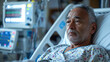 © Anna - Reflective senior African American man lying in a hospital bed with medical equipment in the background.