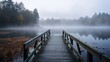 © stocksbyrs - Misty lake with wooden pier in nature