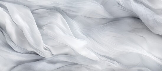 Poster - A close up of a grey cloth with a marble texture resembling a cloudy landscape in monochrome photography, evoking a feeling of freezing wind