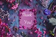 Thank you note on a background with flowers.
